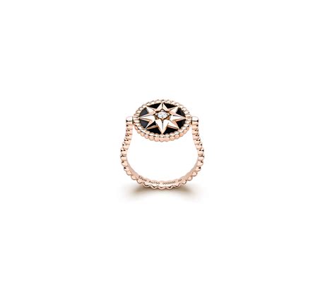 Bague Rose des vents Or rose, diamant et onyx .